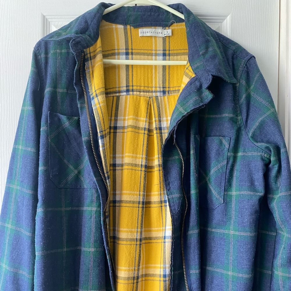 Blue, green, and yellow zip up flannel jacket